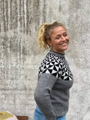 Malteser-sweater med rundt bærestykke